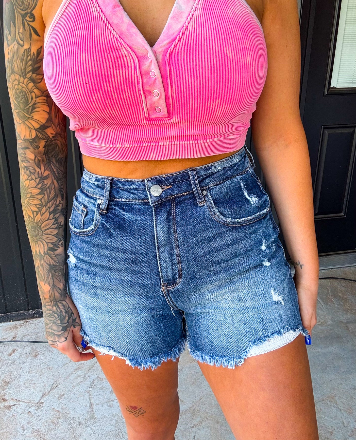 The Bailey Risen High Rise Distressed Denim Shorts