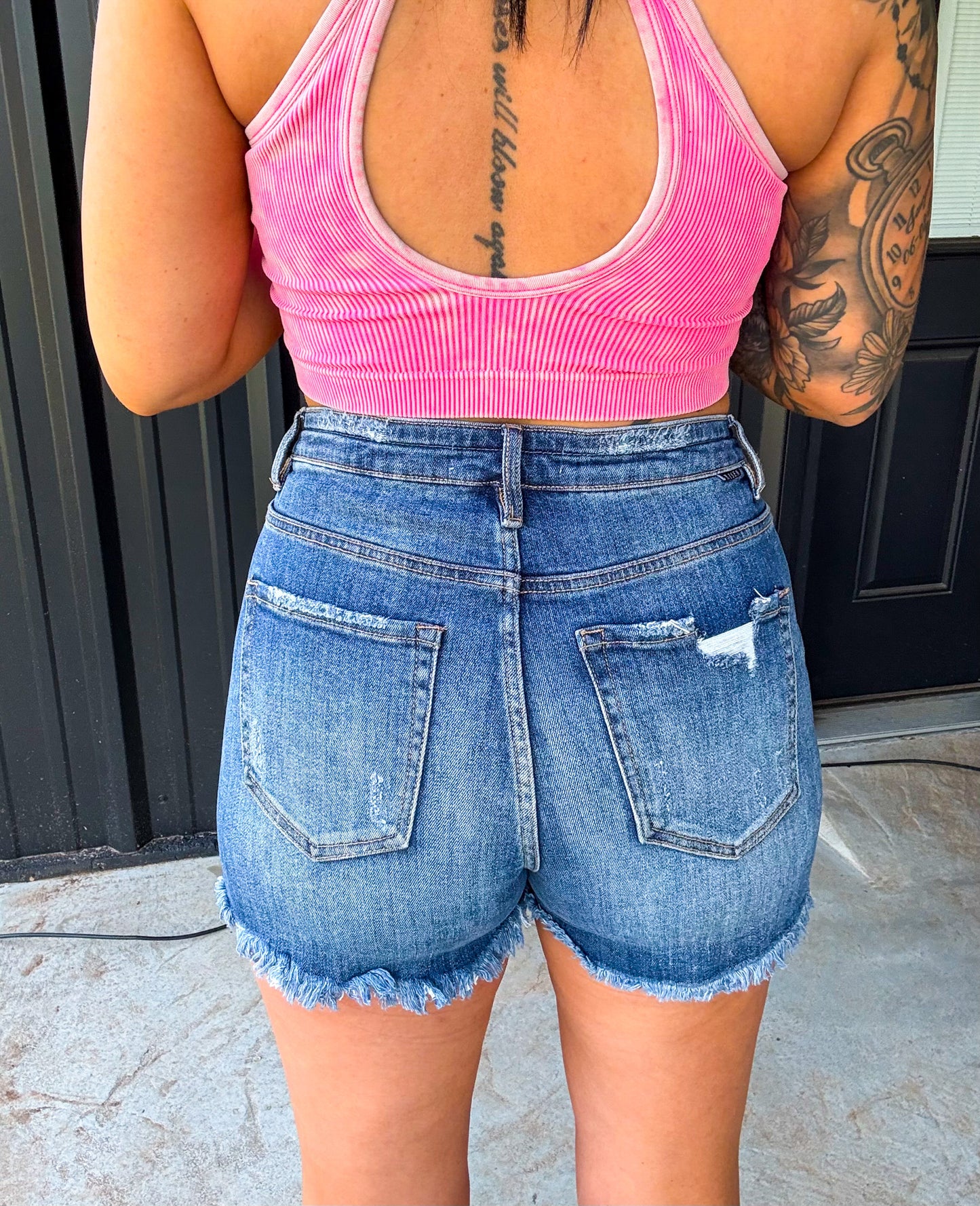 The Bailey Risen High Rise Distressed Denim Shorts