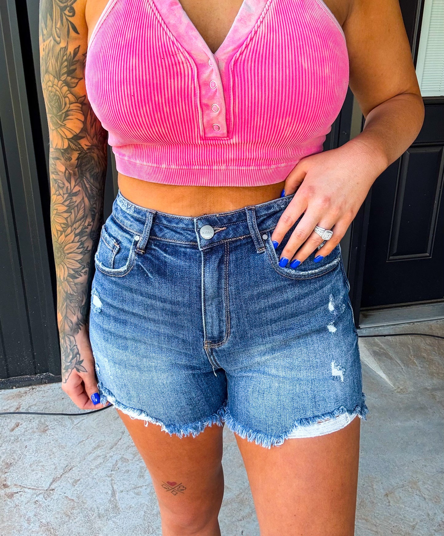 The Bailey Risen High Rise Distressed Denim Shorts
